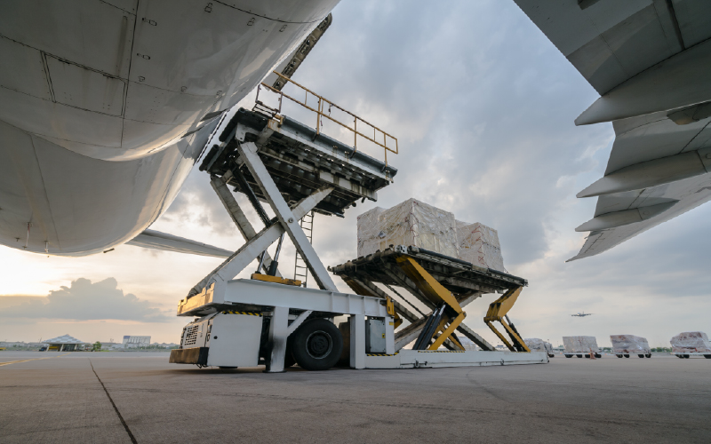 Cargo being loaded into airplane freight
