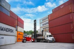 cargo port with truck and shipping containers